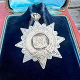 Antique Edwardian Silver Fancy Medallion Fob, 1909 sold by Doyle and Doyle an antique and vintage jewelry boutique