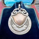 Antique Silver Fancy Medallion Fob, 1924 sold by Doyle and Doyle an antique and vintage jewelry boutique