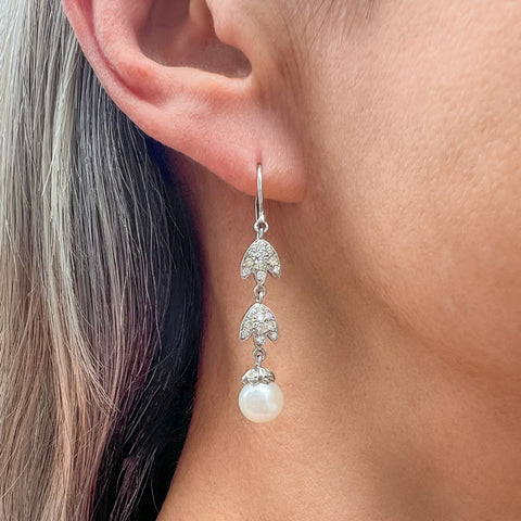 Vintage Diamond & Pearl Drop Earrings sold by Doyle and Doyle an antique and vintage jewelry boutique