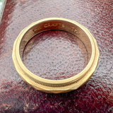 Vintage Faceted Wedding Band sold by Doyle and Doyle an antique and vintage jewelry boutique