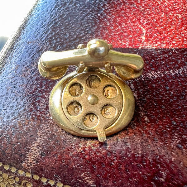 Antique Telephone Charm Pendant sold by Doyle and Doyle an antique and vintage jewelry boutique