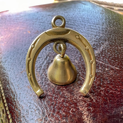 Vintage Horseshoe & Bell Charm Pendant sold by Doyle and Doyle an antique and vintage jewelry boutique