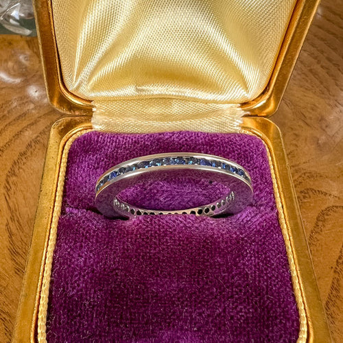 Vintage Sapphire Eternity Band sold by Doyle and Doyle an antique and vintage jewelry boutique