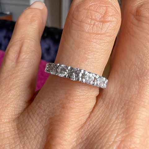 Vintage Seven Stone Diamond Wedding Band sold by Doyle and Doyle an antique and vintage jewelry boutique