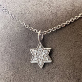 Vintage Diamond Star of David Pendant sold by Doyle and Doyle an antique and vintage jewelry boutique