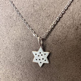 Vintage Diamond Star of David Pendant sold by Doyle and Doyle an antique and vintage jewelry boutique
