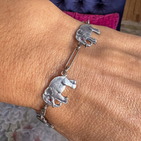 Vintage Enamel Elephant Bracelet sold by Doyle and Doyle an antique and vintage jewelry boutique