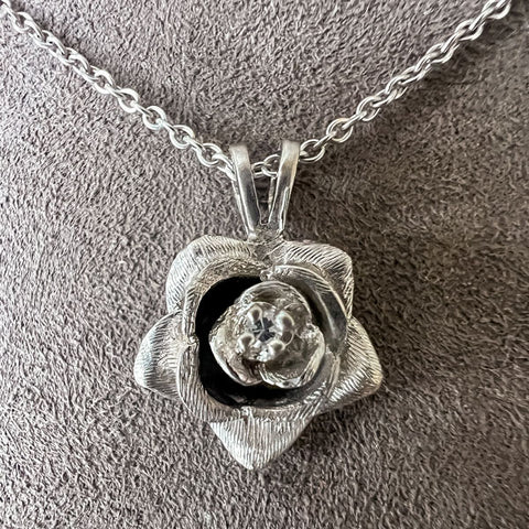 Vintage Diamond Rose Pendant sold by Doyle and Doyle an antique and vintage jewelry boutique