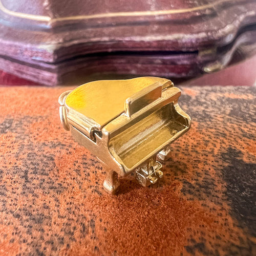 Vintage Piano Pendant sold by Doyle and Doyle an antique and vintage jewelry boutique