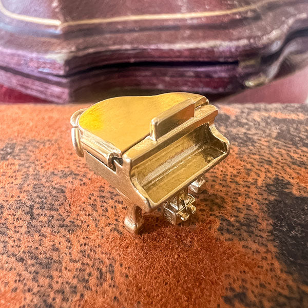 Vintage Piano Pendant sold by Doyle and Doyle an antique and vintage jewelry boutique