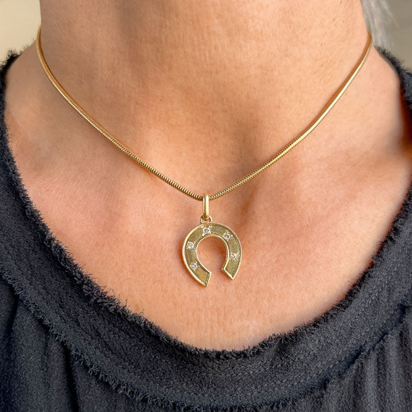 Vintage Diamond Horseshoe Pendant sold by Doyle and Doyle an antique and vintage jewelry boutique