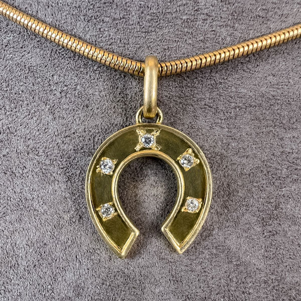Vintage Diamond Horseshoe Pendant sold by Doyle and Doyle an antique and vintage jewelry boutique