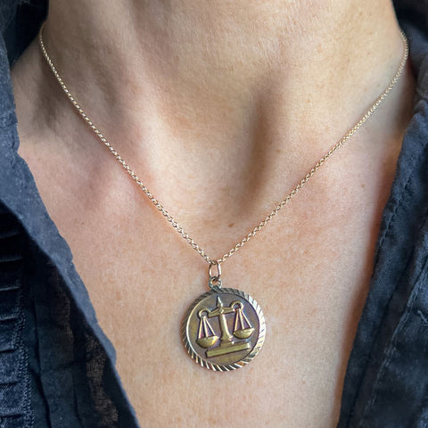Vintage Libra Scale Pendant sold by Doyle and Doyle an antique and vintage jewelry boutique