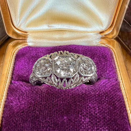 Vintage Filigree Three Stone Engagement Ring, Old Euro. 0.35ct sold by Doyle and Doyle an antique and vintage jewelry boutique