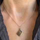 Vintage Teatime Charm sold by Doyle and Doyle an antique and vintage jewelry boutique