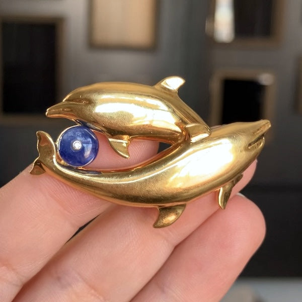 Vintage Gold Sapphire Dolphin Pin, from Doyle & Doyle antique and vintage jewelry boutique