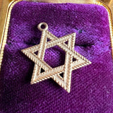 Vintage Star of David Charm sold by Doyle and Doyle an antique and vintage jewelry boutique