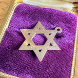 Vintage Star of David Charm sold by Doyle and Doyle an antique and vintage jewelry boutique