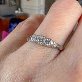 Vintage Three Stone Diamond Ring, RBC 0.20 ctw. sold by Doyle and Doyle an antique and vintage jewelry boutique