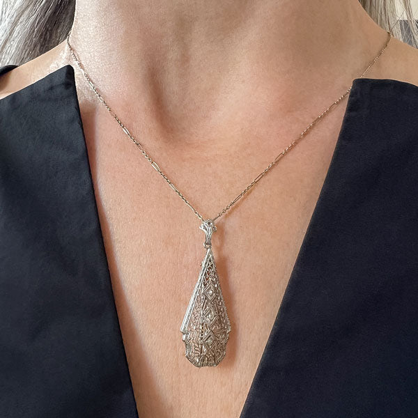 Vintage Filigree Diamond Pendant/ Brooch sold by Doyle and Doyle an antique and vintage jewelry boutique