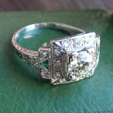 Art Deco Diamond Engagement Ring with emerald accents, sold by Doyle & Doyle antique and vintage jewelry boutique