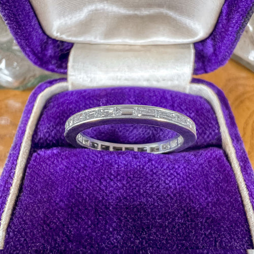 Vintage Baguette Diamond Eternity Wedding Band Ring sold by Doyle and Doyle an antique and vintage jewelry boutique