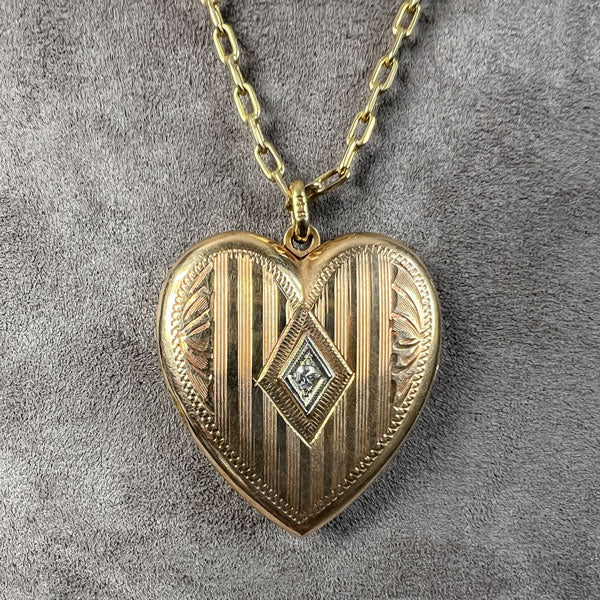 Vintage Diamond Heart Locket sold by Doyle and Doyle an antique and vintage jewelry boutique