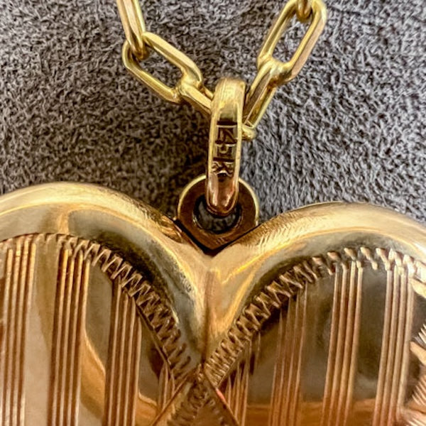 Vintage Diamond Gold Heart Locket sold by Doyle & Doyle an antique and vintage jewelry boutique
