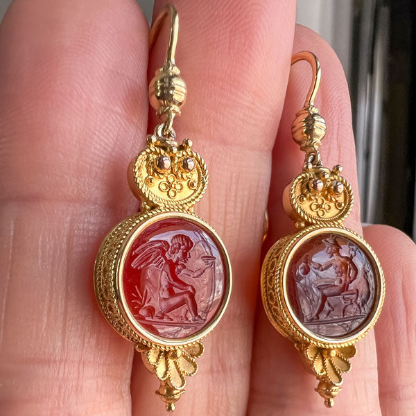 Victorian Etruscan Revival Carnelian Intaglio Earrings, depicting the Devil & Angel, sold by Doyle & Doyle an antique and vintage jewelry boutique