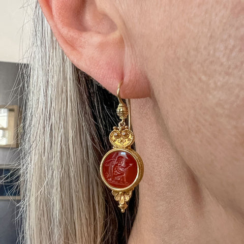 Victorian Etruscan Revival Carnelian Intaglio Earrings, depicting the Devil & Angel, sold by Doyle & Doyle an antique and vintage jewelry boutique