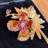 Vintage Ruby & Diamond Opening Seed Pod Pin in yellow gold, sold by Doyle & Doyle antique and vintage jewelry boutique