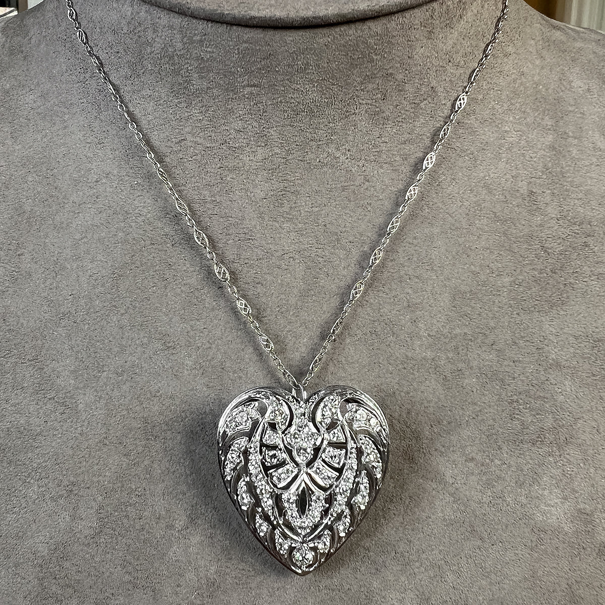 Vintage Filigree Diamond Brooch/ Pendant sold by Doyle and Doyle an antique and vintage jewelry boutique 