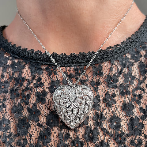 Vintage Filigree Diamond Brooch/ Pendant sold by Doyle and Doyle an antique and vintage jewelry boutique 