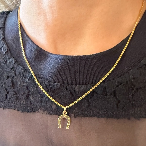 Vintage Gold Horseshoe Pendant sold by Doyle and Doyle an antique and vintage jewelry boutique
