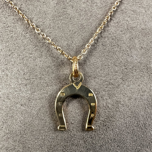 Vintage Gold Horseshoe Pendant sold by Doyle and Doyle an antique and vintage jewelry boutique