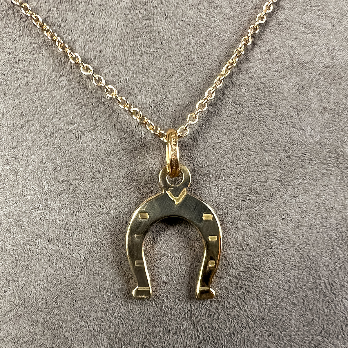 Vintage Gold Horseshoe Pendant sold by Doyle and Doyle an antique and vintage jewelry boutique