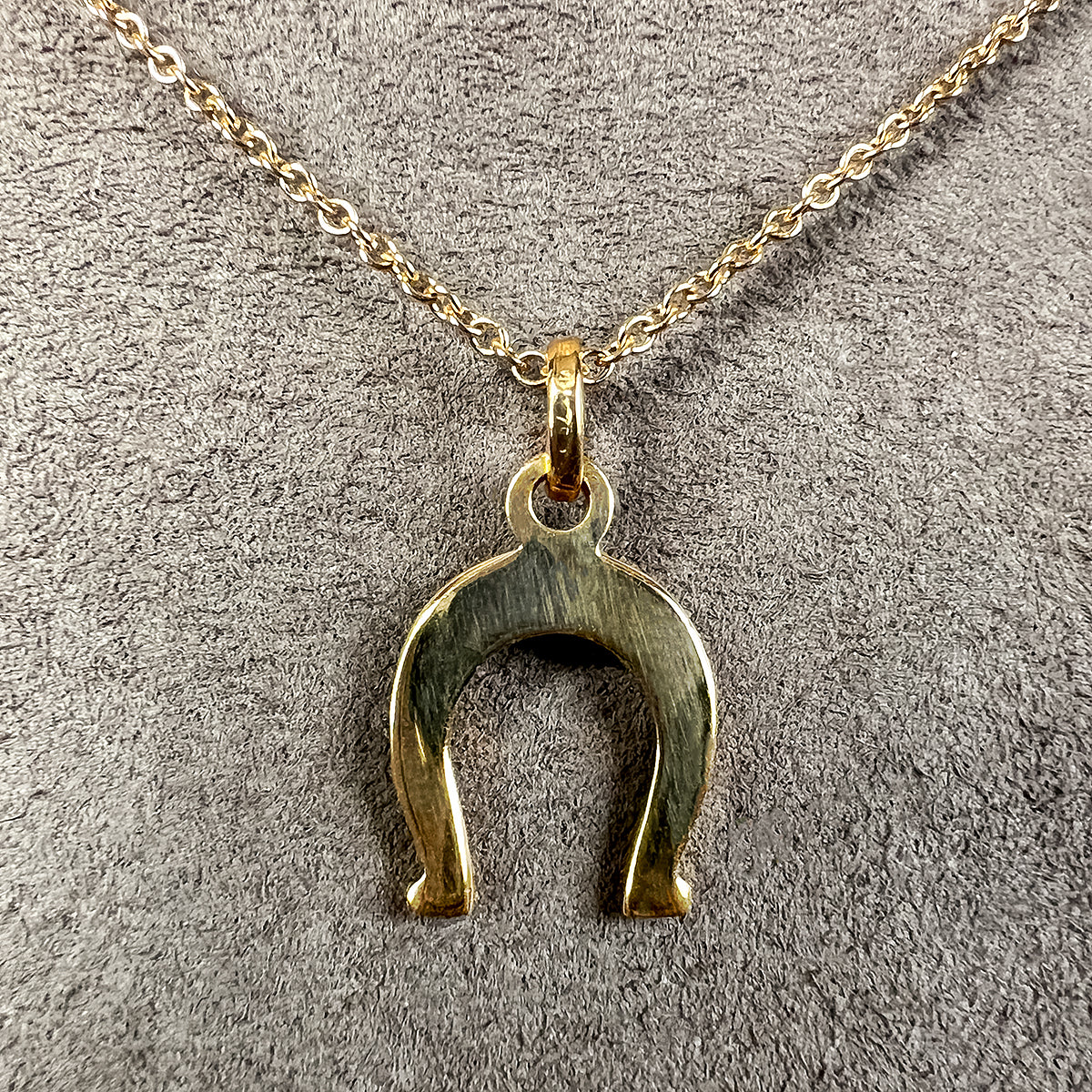 Vintage Gold Horseshoe Pendant sold by Doyle and Doyle an antique and vintage jewelry boutique