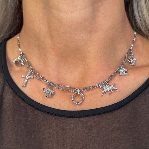 Art Deco Diamond Charm Necklace sold by Doyle and Doyle an antique and vintage jewelry boutique