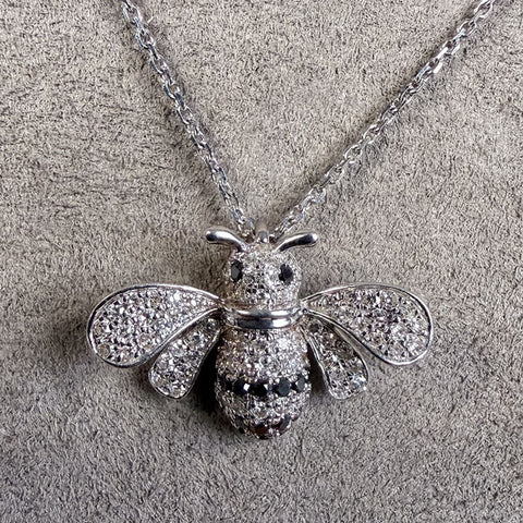 Vintage Diamond Bee Pendant sold by Doyle and Doyle an antique and vintage jewelry boutique