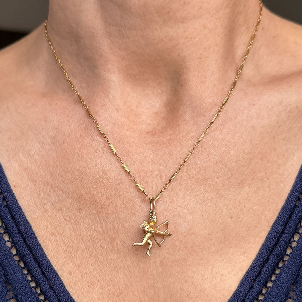 Vintage Gold Cupid Pendant Charm, sold by Doyle & Doyle antique and vintage jewelry boutique