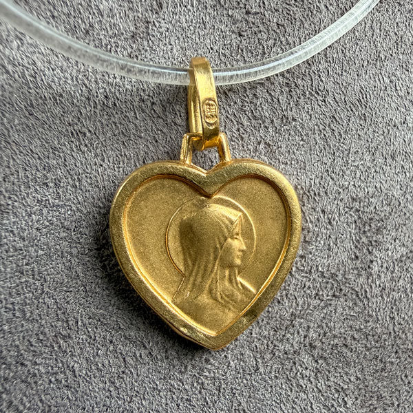 Vintage Virgin Mary Heart Shaped Pendant sold by Doyle and Doyle an antique and vintage jewelry boutique