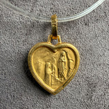 Vintage Virgin Mary Heart Shaped Pendant sold by Doyle and Doyle an antique and vintage jewelry boutique