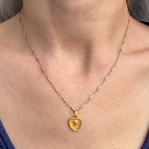 Vintage Virgin Mary Heart Shaped Pendant sold by Doyle and Doyle an antique and vintage jewelry boutique