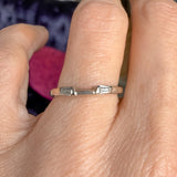 Vintage contoured wedding band set with tapered baguette diamonds, sold by Doyle & Doyle antique and vintage jewelry boutique