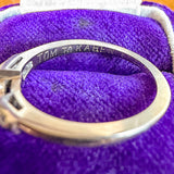 Vintage contoured wedding band set with tapered baguette diamonds, sold by Doyle & Doyle antique and vintage jewelry boutique