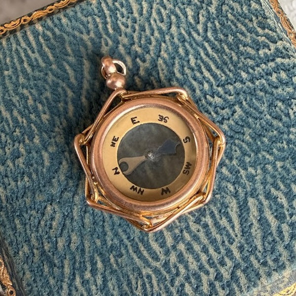 Vintage Gold Compass Pendant, sold by Doyle & Doyle an antique and vintage jewelry boutique
