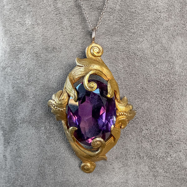 Antique Amethyst Pendant with gold scrolling frame, from Doyle & Doyle antique and vintage jewelry boutique