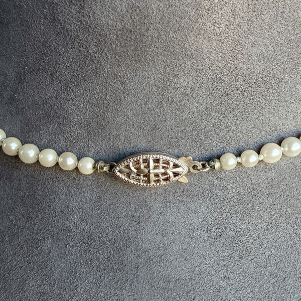 Vintage Pearl Graduated Single Strand Necklace sold by Doyle and Doyle an antique and vintage jewelry boutique