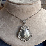 Silver Medallion Pendant Necklace sold by Doyle and Doyle an antique and vintage jewelry boutique