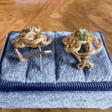 Vintage Diamond & Emerald Knot Earrings, sold by Doyle & Doyle antique and vintage jewelry boutique